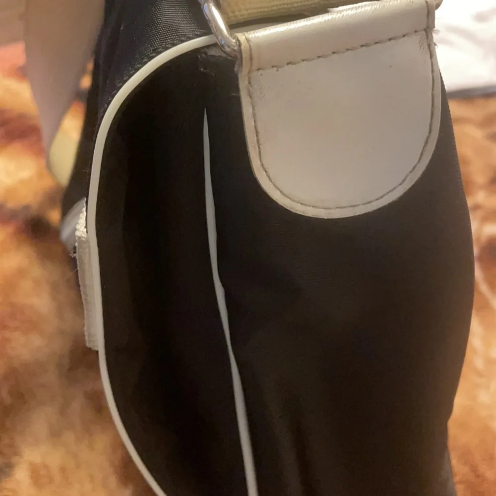 Lacoste Black Messenger Bag with White Trim and Green Logo